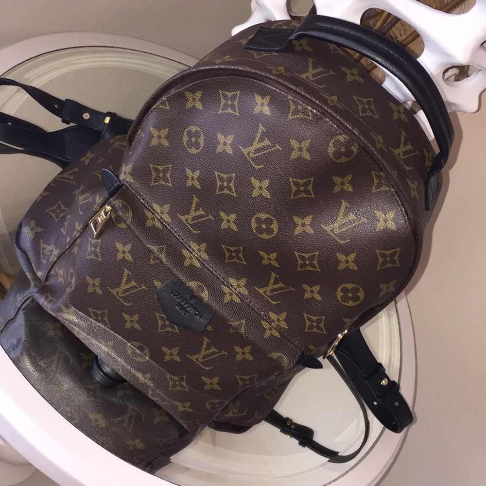 Brown & Black leather backpack 🤗